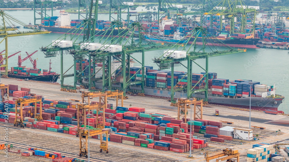 Commercial port of Singapore . Bird eye panoramic view of busiest Asian cargo port