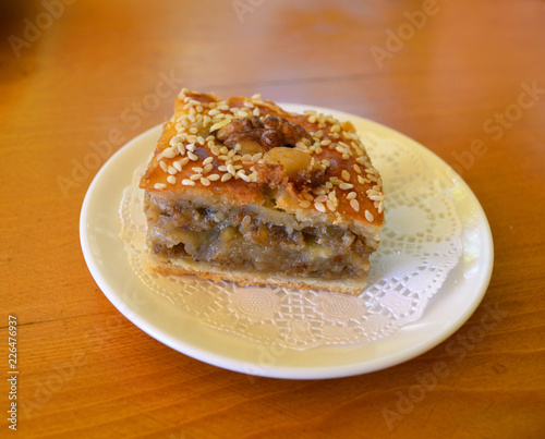 Baklava on a white napkin and a white plate