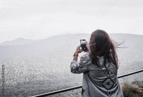 Wallpaper Mural girl with camera Torontodigital.ca