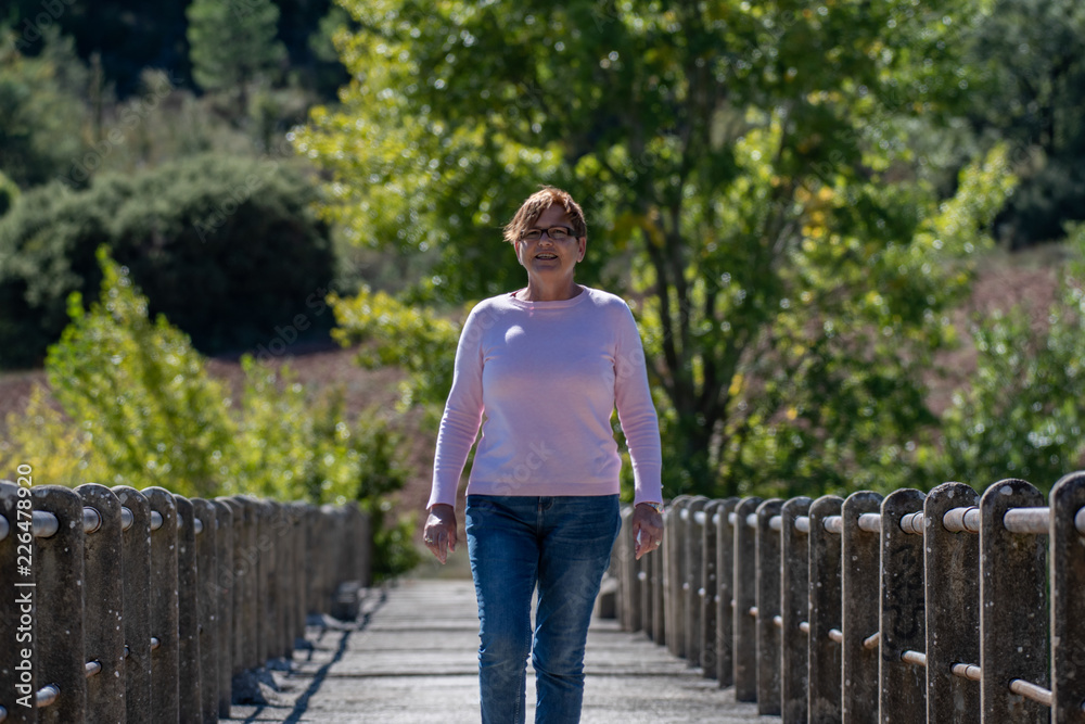 Woman on bridge