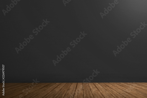 Black wall and wooden floor