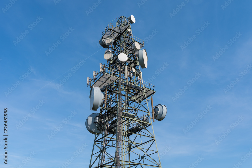 Transmission tower on the Koeterberg mount against sky, Germany Transmission tower on the Koeterberg mount against sky, Germany