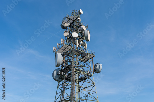 Transmission tower on the  Koeterberg mount  against sky,  Germany