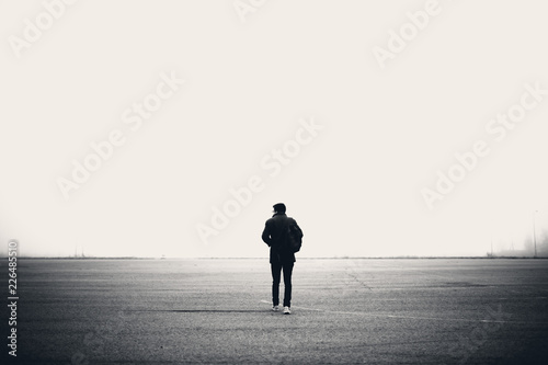 Alone man in open place