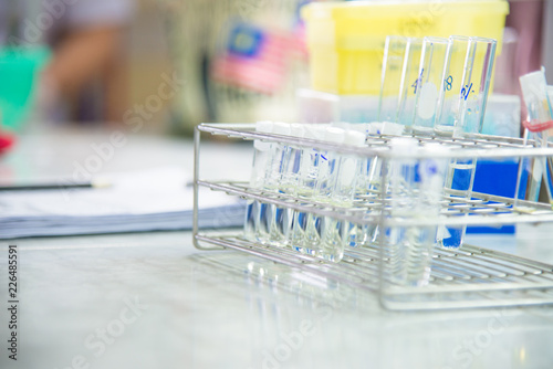 Cuadro en lienzo Blurred test tube in white laboratory.