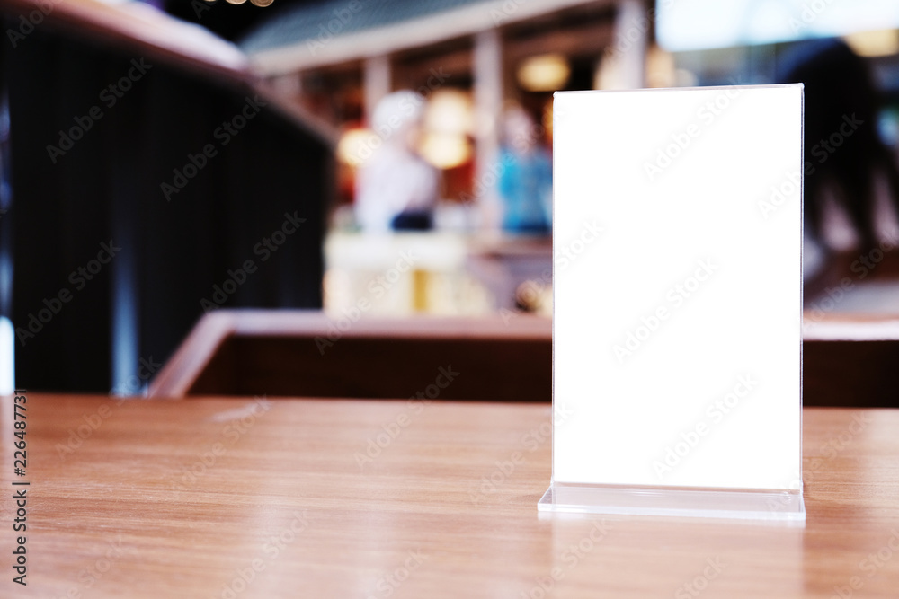 Menu frame standing on wood table in Bar restaurant cafe. space for text marketing promotion. Menu frame standing on wood table in Bar restaurant cafe. space for text marketing promotion.
