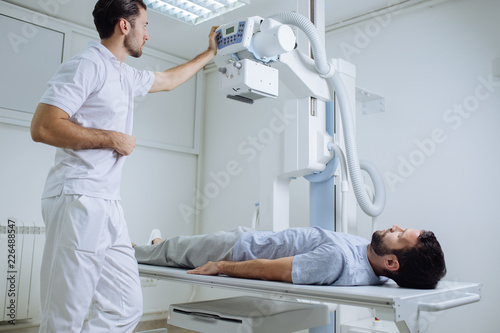 Technician Operating an X-ray Machine