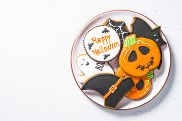Halloween food bakground -Gingerbread Cookies on white table.