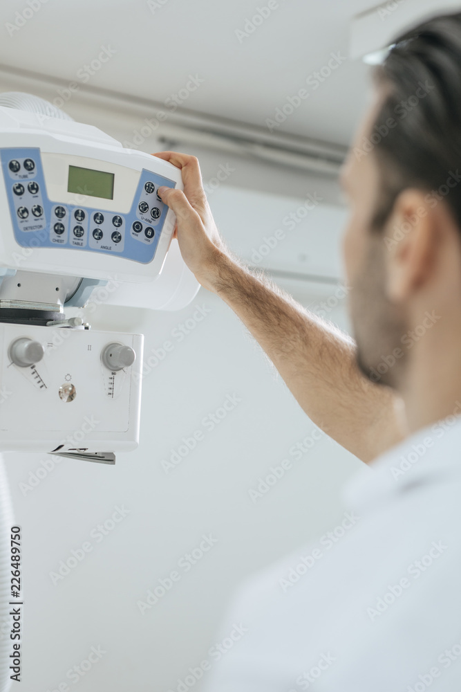 Technician Operating an X-ray Machine Technician Operating an X-ray Machine