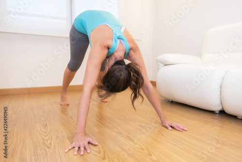 Young attractive woman practicing yoga