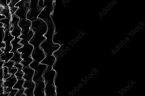 Abstract wave motion lines on dark background for creative, dynamic, interesting backgrounds and ideas.