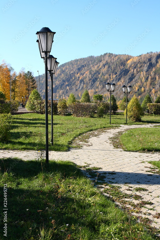Old street lights in the autumn Park.