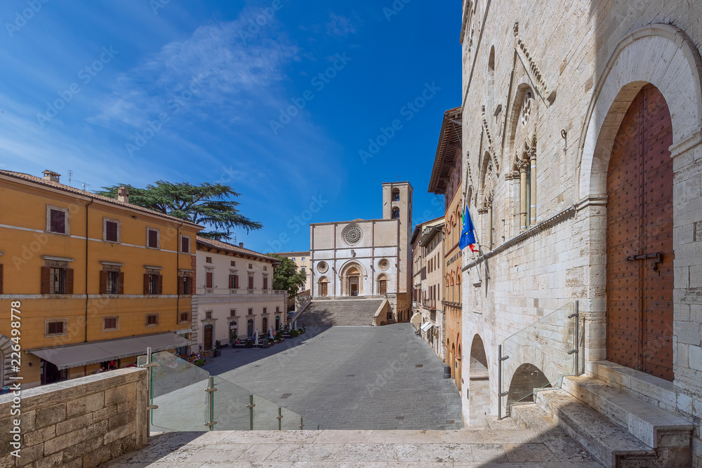 Beautiful panoramic view of the central town square and The Gothic cathedral of Santa Maria Assunta of the ancient town of Todi (Piazza del Popolo) Umbria, Italy