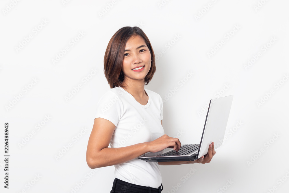 portrait asian young woman holding laptop computer on white background portrait asian young woman holding laptop computer on white background