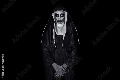 portrait of a frightening evil nun