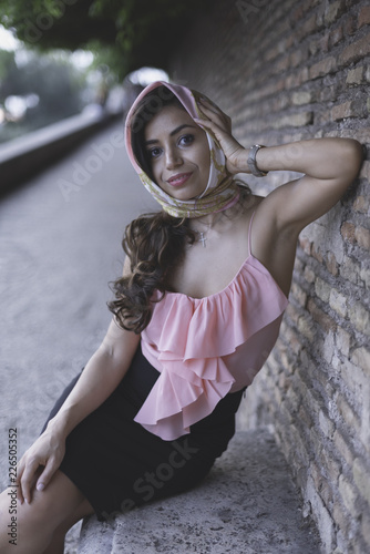 Amazing elegant young woman in Rome