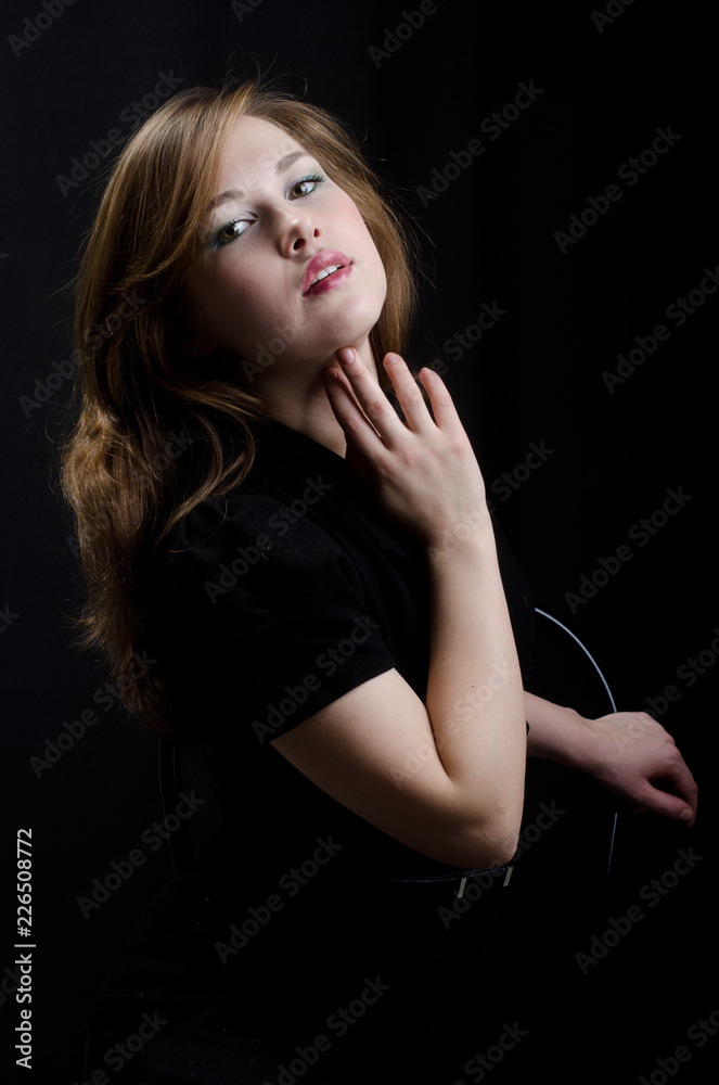 Naklejka premium beautiful girl in the Studio