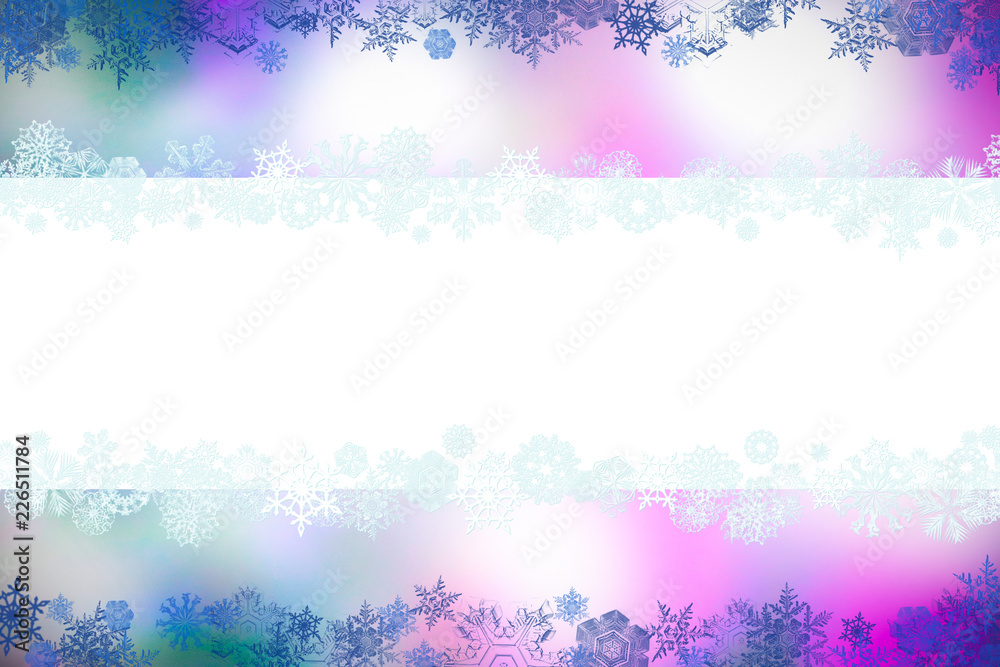 Christmas card with snowflakes and place for greetings on on a blurry white-pink-lilac background. Сhristmas, New Year winter composition, top view, flat lay, with copy space