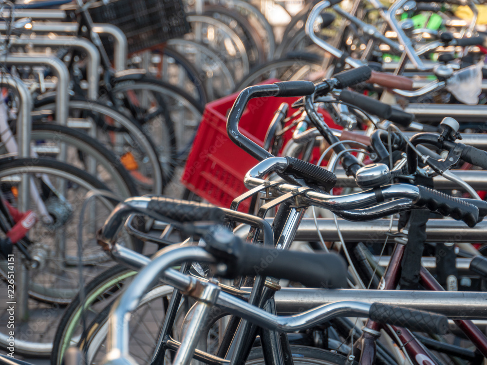 Bikes parking in Amsterdam - World capital of bicycle transportation. Bikes parking in Amsterdam - World capital of bicycle transportation.