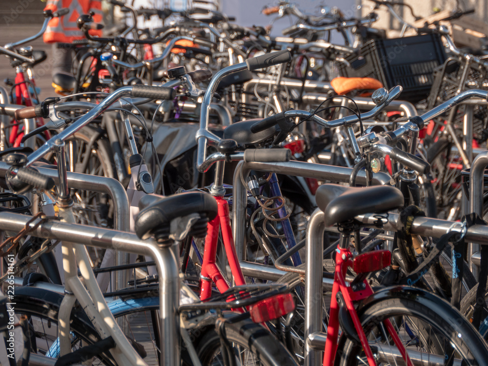 Obraz premium Bikes parking in Amsterdam - World capital of bicycle transportation.