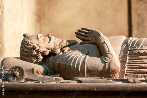 Fragment of a medieval sarcophagus with a figure of a knight photo