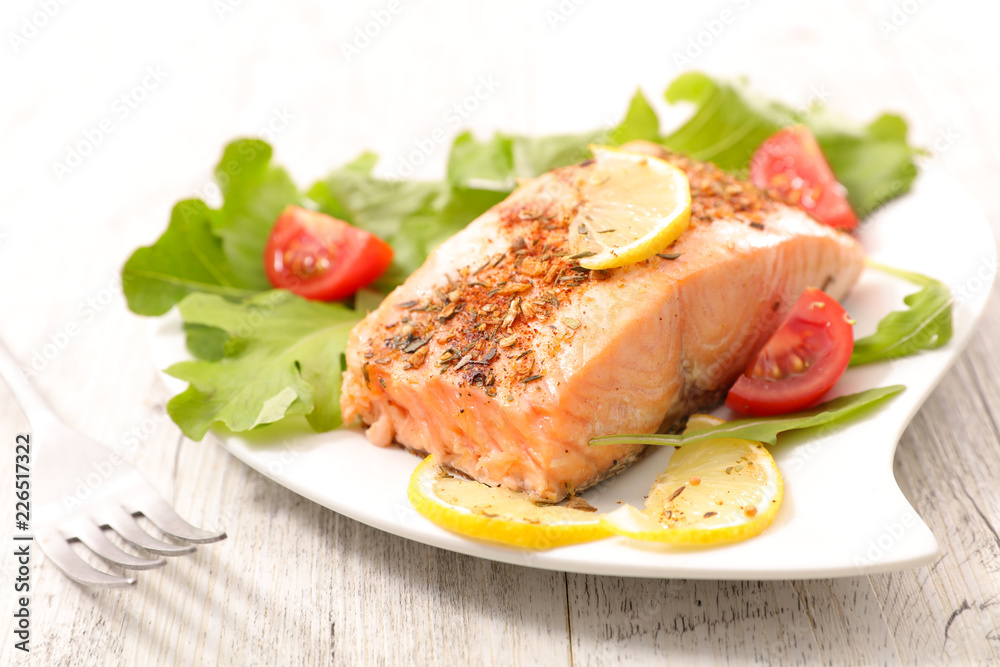 salmon fillet with herbs and lemon