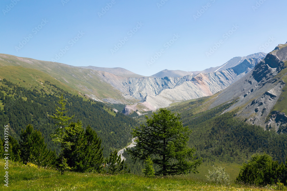 Fototapeta premium View from the top of the mountain. High mountains landscape, breathtaking beauty of the mountains.