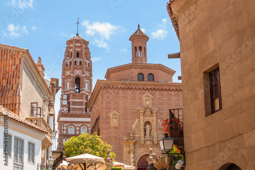 Photography Mudejar bell tower in Spanish village or Poble Espanyol in Barcelona, Spain
