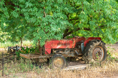 Old tractor in countryside.