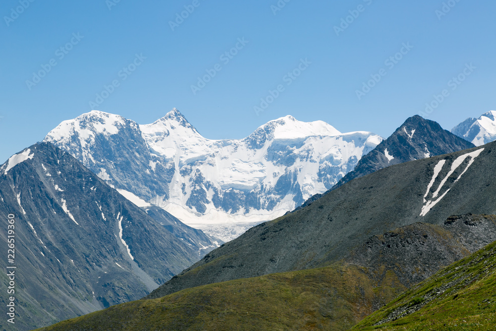 View from the top of the mountain. High mountains landscape, breathtaking beauty of the mountains.