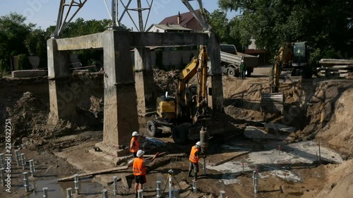 timelipse of screwing piles during the construction of foundation photo