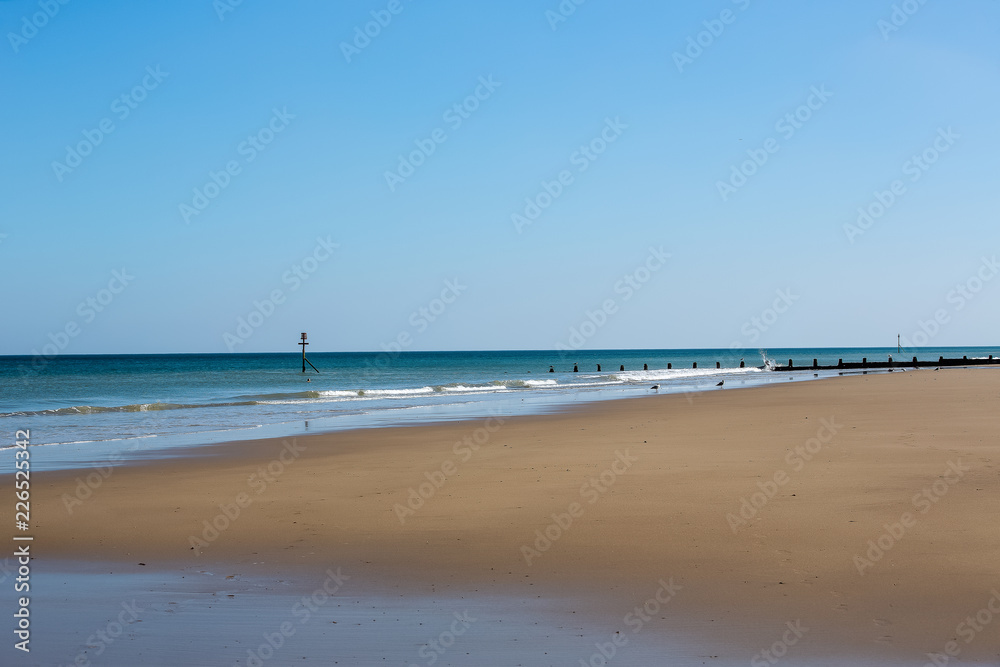 A deserted sandy beach, Cromer beach UK