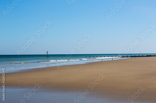 A deserted sandy beach  Cromer beach UK