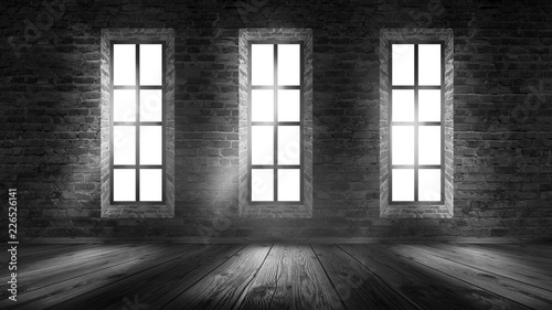 A brick wall in an empty room  large wooden windows  a magical light and the rays of the sun.