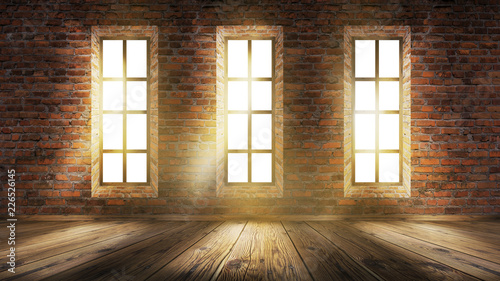 A brick wall in an empty room  large wooden windows  a magical light and the rays of the sun.