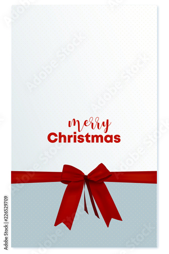 Weihnachtsgeschenk mit roter Schleife