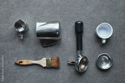 top view of professional tools for preparing coffee on grey