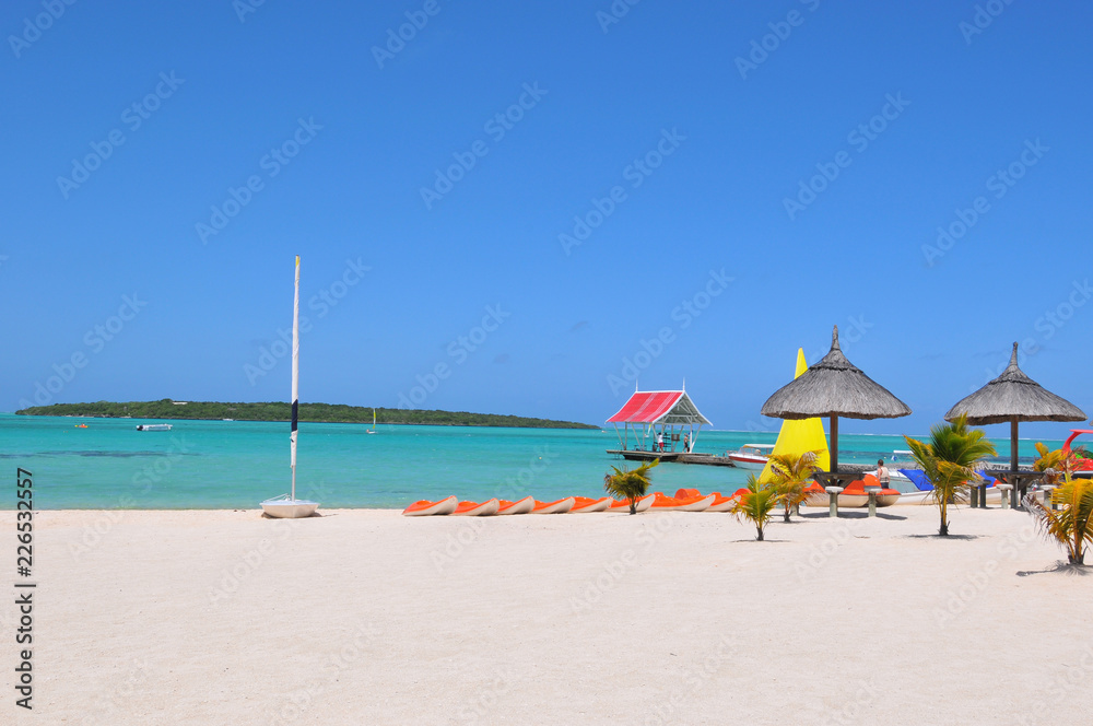 umbrellas on the beach , tropical island , colorful boats on the beach, 