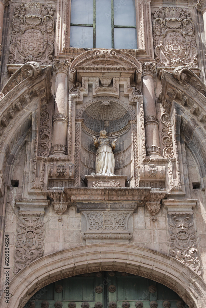 Close up of old catholic church facade in Cuzco Peru