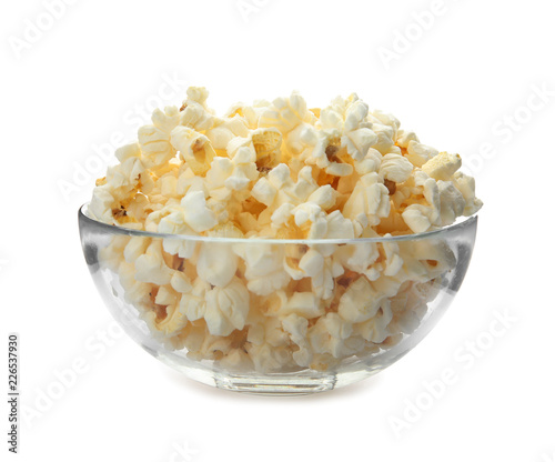 Bowl with delicious fresh popcorn on white background