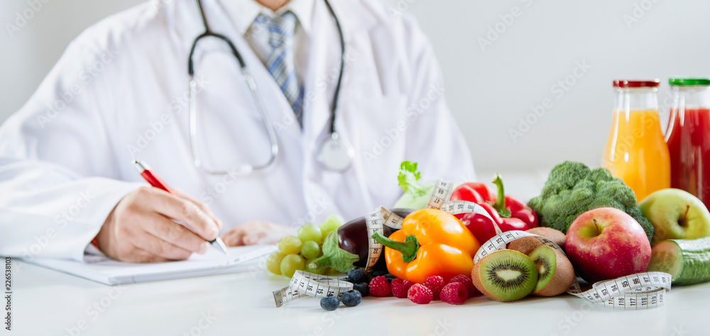 Doctor or dietitian writing a healthy food recipe