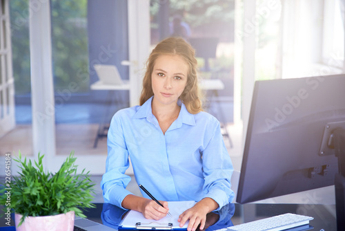 Sales woman working in the office