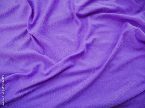 purple silk fabric background.sportswear cloth