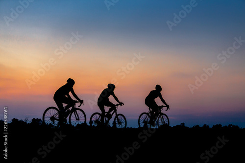 Silhouette of cyclist on the background of beautiful sunset