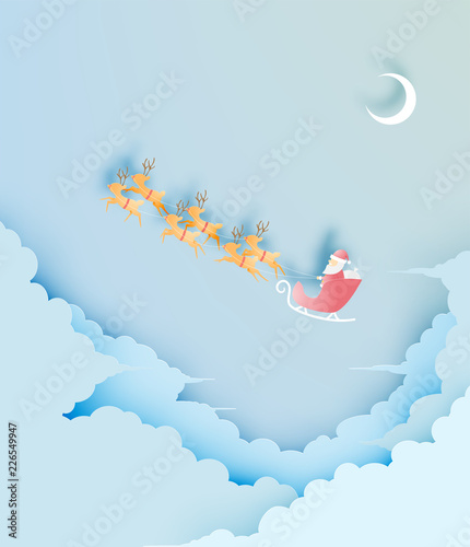 Fototapeta Naklejka Na Ścianę i Meble -  Santa claus on the sleigh with beautiful sky in paper art and pastel schenme