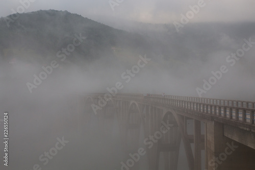 Bridge in fog photo