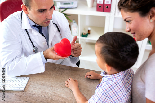 Responsible doctor ensuring his patient and his mother