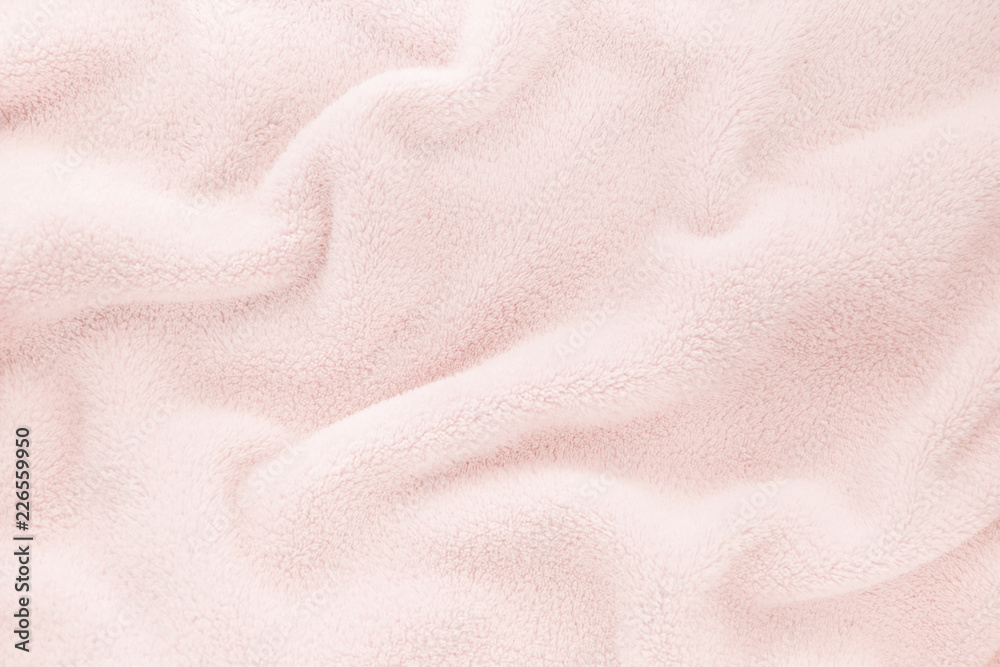 Fluffy Gentle baby pastel pink rose fabric with waves and folds. Soft  pastel textile texture. Folds on the soft fabric. Rose towel terry cloth.  Stock Photo