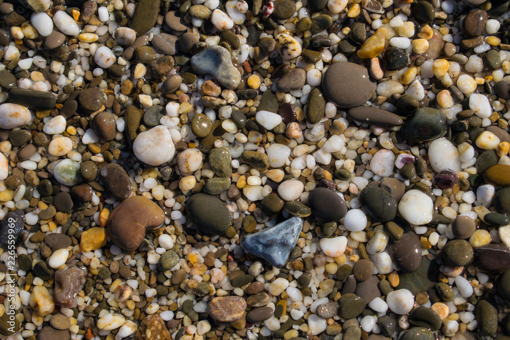 Background texture of wet beautiful sea stones Background texture of wet beautiful sea stones