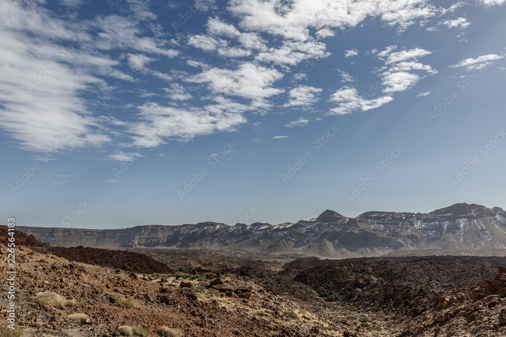 Desert landscape with big mountains in the background on a sunny day on the island of Tenerife Desert landscape with big mountains in the background on a sunny day on the island of Tenerife